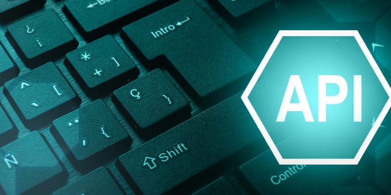 A keyboard with API acronym word icon illustrates API testing and its scope in career.