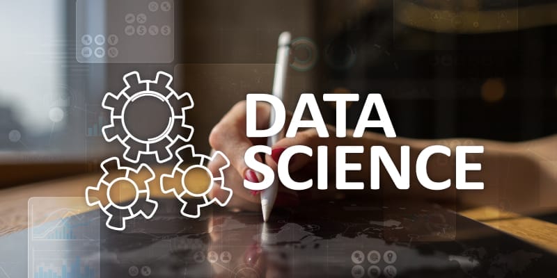 Image of a hand touching a virtual screen with the text Data Science illustrates Data science and deep learning for career opportunities.