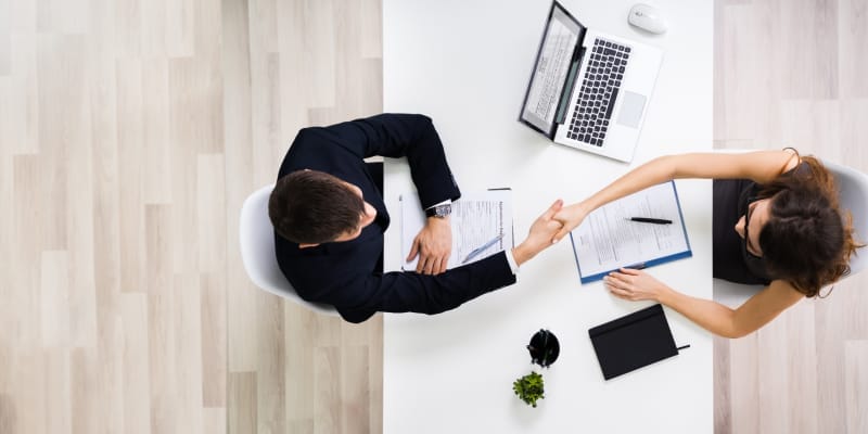 Overhead view of job recruitment.