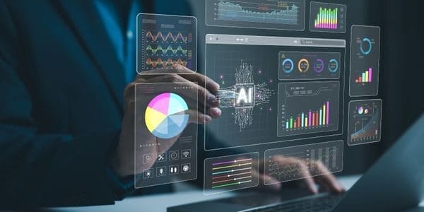 A professional working with data analytics dashboard with graphs, charts, and AI insights.